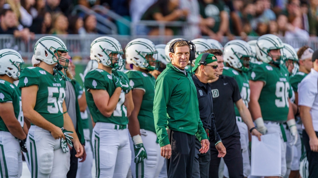 Buddy Teevens stands on the sideline with the Dartmouth football team