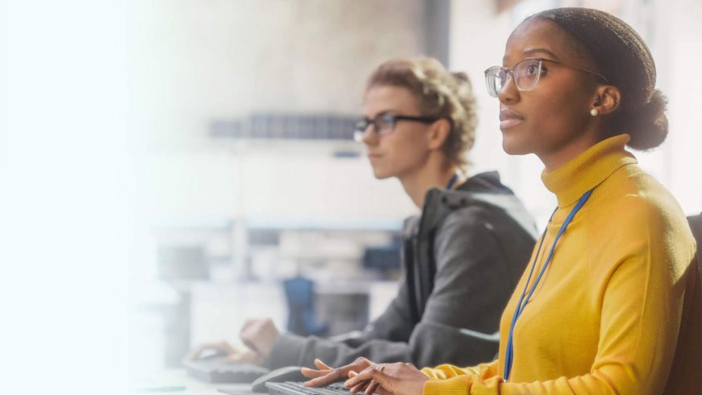 Two women at keyboards