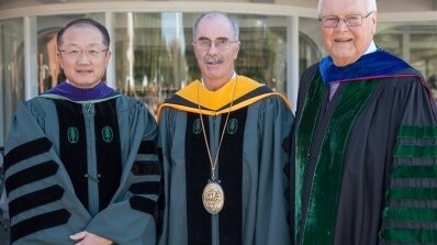 President's Kim, Hanlon and Wright pose at commencement.